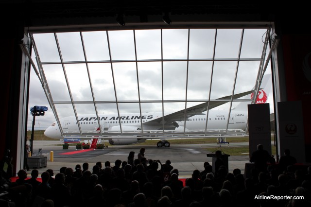 JAL's Boeing 787 Dreamliner is revealed to the crowd.
