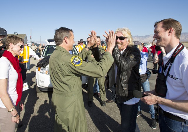 Sir Richard Branson & 'Forger' aka Mark Stucky congratulate each other after the completion of SS2's first rocket-powered flight - Photo: Mark Greenberg