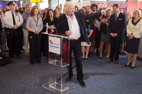 Richard Branson points at something.