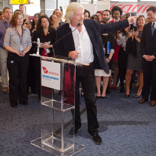 Richard Branson points at something.