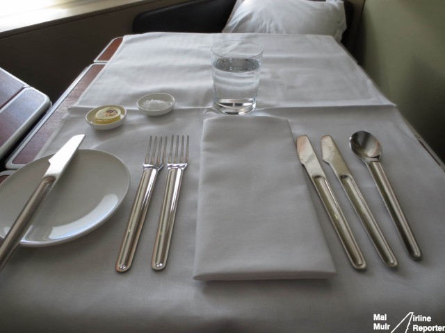 Table set for lunch with Pepe Saya butter & Marc Newson Cutlery - Photo: Mal Muir | AirlineReporter.com