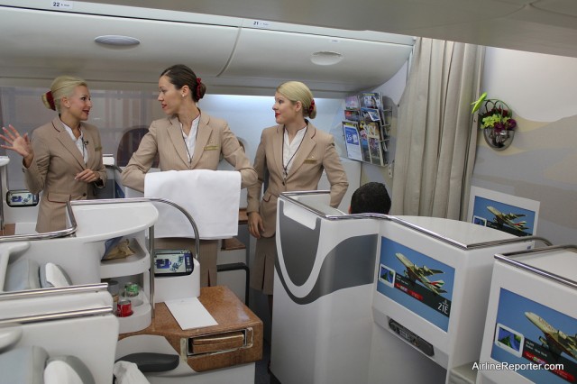 Flight Stewardesses train how to properly serve passengers in this Airbus A380 mock interior trainer. 