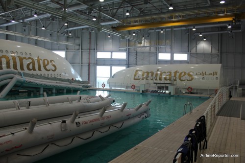 Emirates Airbus A380 and A330/A340 trainers next to the training pool.