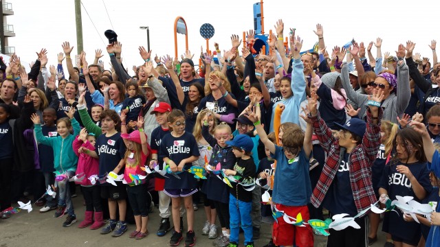 The JetBlue and KaBOOM crew celebrate the completion of construction at the playground