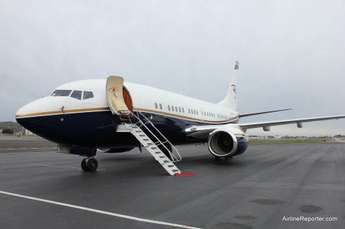 This BBJ has its own built in stairs. The red carpet is a nice added touch.