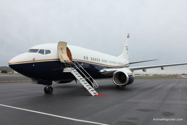 This BBJ has its own built in stairs. The red carpet is a nice added touch. 