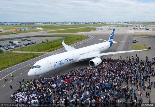 The completed A350 XWB MSN001 is welcomed by Airbus employees in Toulouse. Photo from Airbus.