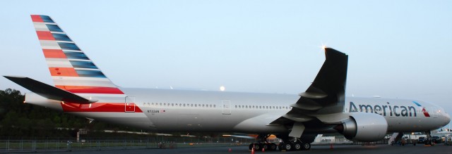 An American Airlines Boeing 777-300ER sits at Boeing Field. 