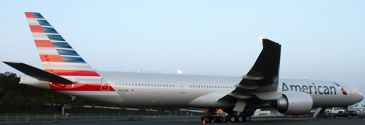 An American Airlines Boeing 777-300ER sits at Boeing Field.