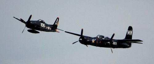 Not all the planes just sit on the ground. F7F Tigercat and F8F Bearcat in formation. Photo by Liz Matzelle.