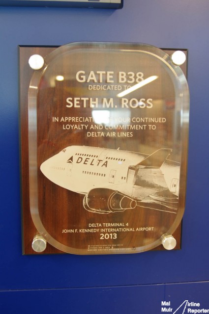 Each new gate at the T4 extension is dedicated to a Delta Staff member and inscribed into an actual Boeing 737/757 Window Panel - Photo: Mal Muir | AirlineReporter.com