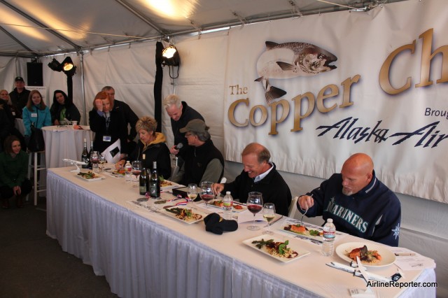The judges have the hard job of eating salmon, drinking wine and making the big decision for the winner.