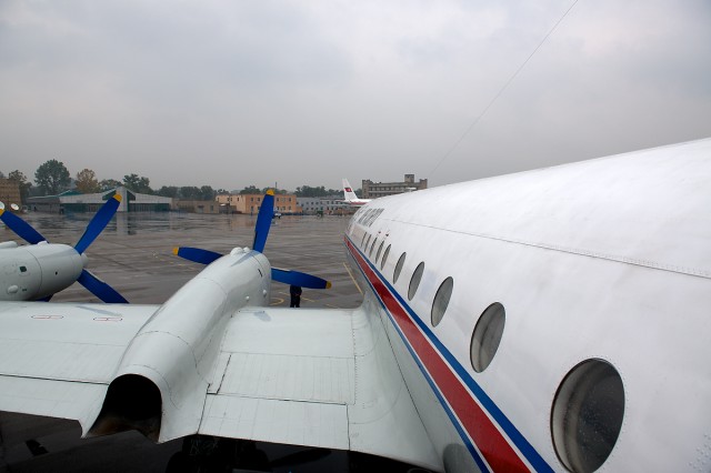 Boarding the IL-18 (P-835) in Pyongyang. Photo by Bernie Leighton.