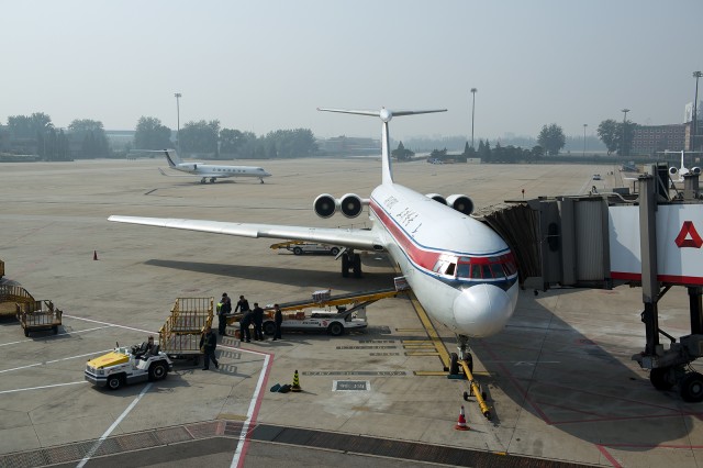 An Air Koryo Ilyushin IL-62 in Beijing, ready for boarding. Photo by.