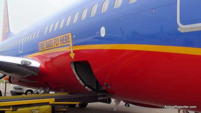 Not only do bags fly free on Southwest, you can change your ticket for free too. 