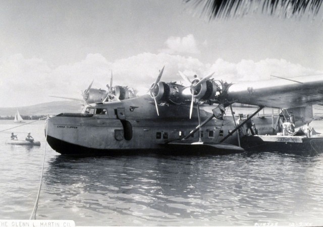 A Martin MB-130 Flying Boat, the original "China Clipper" tied up to a dock somewhere in the South Pacific - Photo: Lockheed Martin