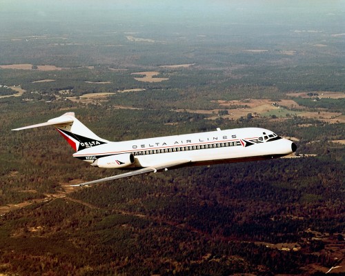 DC-9 "Delta Prince" in flight over wooded area, taken in the 1960's. Image courtesey of Delta Air Lines.