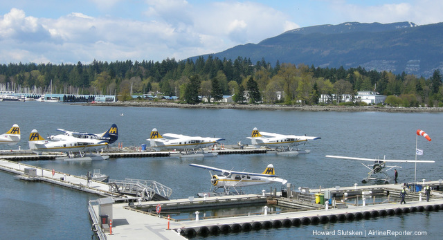 Vancouver harbour seaplane terminal with LOTS of Harbour Air seaplanes
