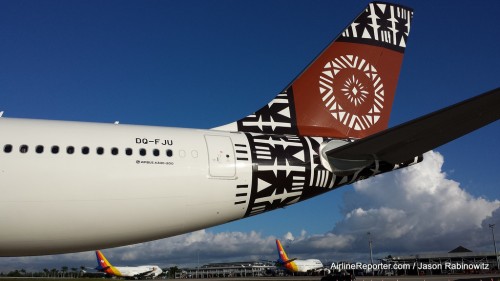 New and old. The Fiji Airways Airbus A330 tail with the older Air Pacific Boeing 747-400s in the background.