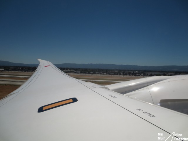 Airborne from San Jose Airport.  The 787's composite wing is already flexing just metres off the ground - Photo: Mal Muir | AirlineReporter.com