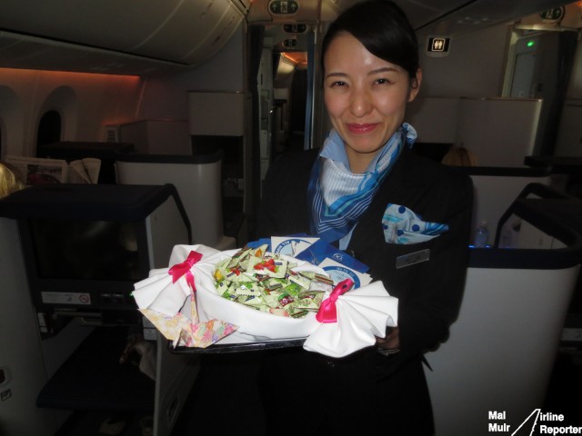 A lovely display of free candy, offered by an ANA Cabin Crew member, prior to arrival at Tokyo's Narita Airport - Photo: Mal Muir | AirlineReporter.com