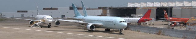 Multiple aircraft waiting to be worked on. Photo by JL Johnson. 