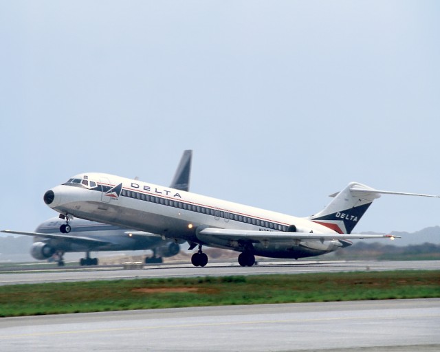 Delta DC-9 in updated livery. Check out the L1011 in the background. Image courtsey of Delta Air Lines. 