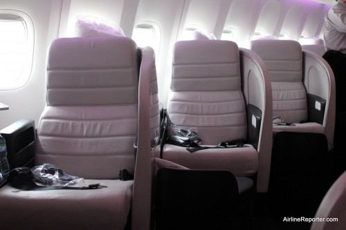 The "window" seats face away from the window, which isn't so great for AvGeeks, but does provide more privacy.