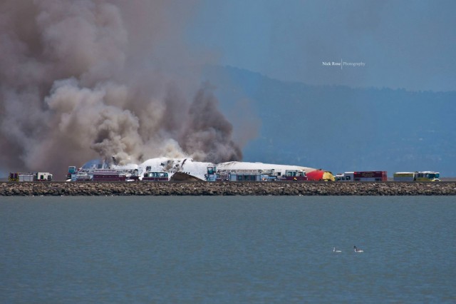 Asiana Airlines Flight 214 burns at SFO. Photo by Nick Rose. 