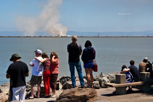 People view the disaster from Bay Front Park. Photo by Nick Rose.