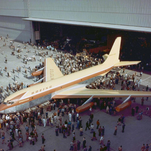 The predecessor to the Boeing 707, the famous 367-80, rolled out at Renton on May 15, 1954. It was the only one built; and is narrower then a 707. This is the very aircraft that famed Boeing test pilot Alvin ”Tex" Johnston barrel rolled in front of a demo to Boeing customers over Lake Washington in 1955. On May 26, 1972 Boeing donated the Dash 80 to the Smithsonian Air and Space Museum, which had designated it one of the 12 most significant aircraft of all time. For the next 18 years the aircraft was stored at a ”desert boneyard" in Arizona before being retrieved by Boeing in 1990 for restoration, though it was used for some flight testing sporadically during that time. The Dash 80"²s final flight was to Dulles International Airport near Washington, D.C. on August 27, 2003. it is now on display in the Steven F. Udvar-Hazy Center at Washington Dulles International Airport in Virginia. Image courtesy: Boeing