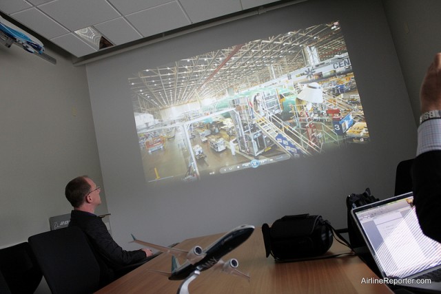 We were shown a Boeing 737 promotional video. The arm/hand on the right is Chris Sloan with Airchive.com -- we did the tour together. 