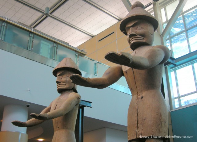 "The Welcome Figures" by Joe David International Arrivals area - YVR