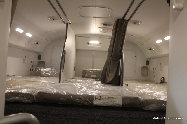 The crew rest area in the upper rear of the 787. 