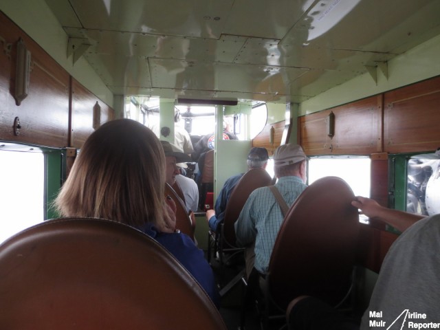 Onboard the Tri Motor, feels and looks more like a Railway carriage with the bare metal and wooden paneling - Photo: Mal Muir | AirlineReporter.com