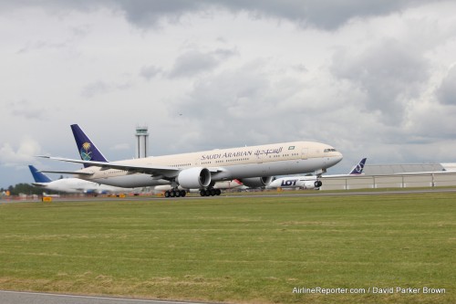 A brand spanking new Boeing 777-300ER takes off and heading to Saudi Arabia.