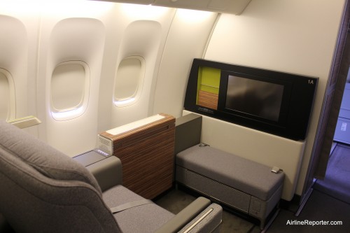 Each first class seat has a large screen. It almost needs a fire place to be complete, but fire and planes do not mix.