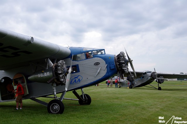 Little Ford & Big Ford.  The two Vintage Ford Tri Motors offering joy flights at EAA AirVenture in OshKosh - Photo: Mal Muir | AirlineReporter.com