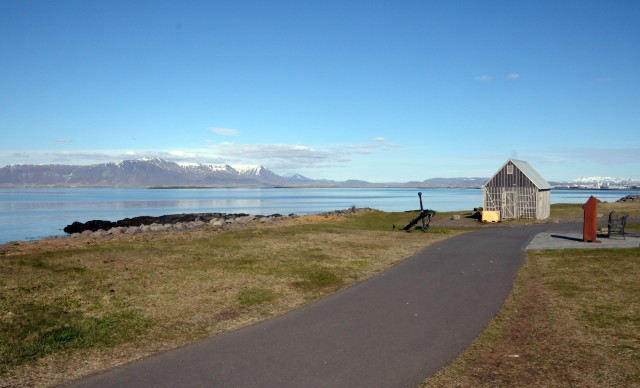 The Reykjavà­k waterfront path is peppered with art installations, hotsprings bubbling steaming water out into the Atlantic, and Hákarl curing shacks.