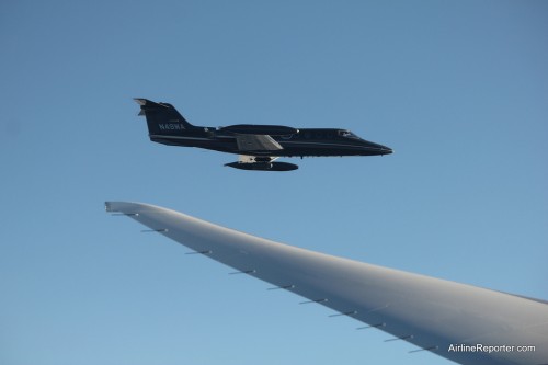 The chase plane seen from the LAN787 Dreamliner.