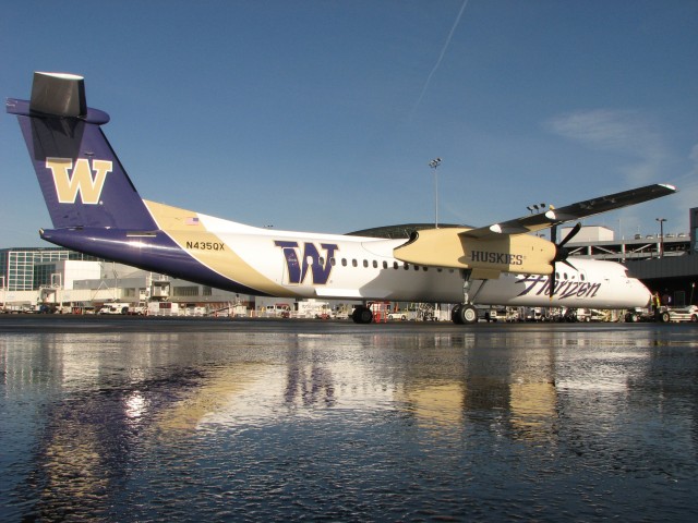 Alaska Q400 painted in Washington Huskies livery (alma mater of @bnickeson and @ardpb) - Photo: Alaska Airlines