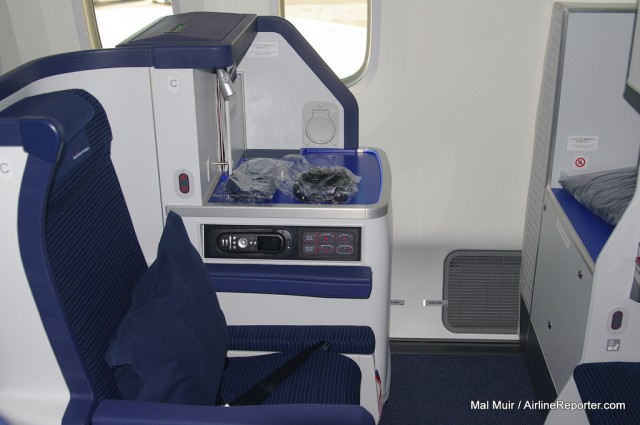This 787 () is configured with ANA's international business product. 