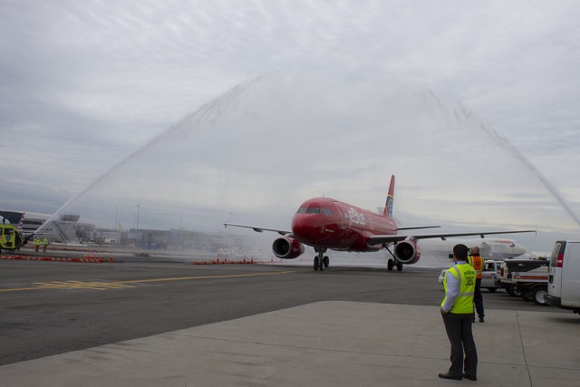 What special fire department livery is not complete without a water cannon salute? Image: JetBlue / Flickr