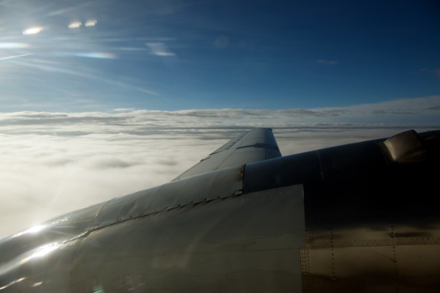 The wing view of a Convair 580 in flight