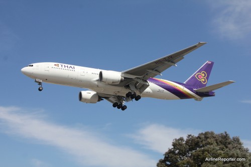 Thai Airways Boeing 777-200. Walked down the street a bit to get better lighting. Love this livery.