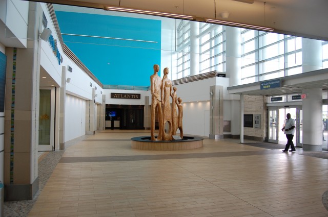 Arrivals area at NAS, with check-in lounges for the major resorts - Photo: Blaine Nickeson | AirlineReporter.com