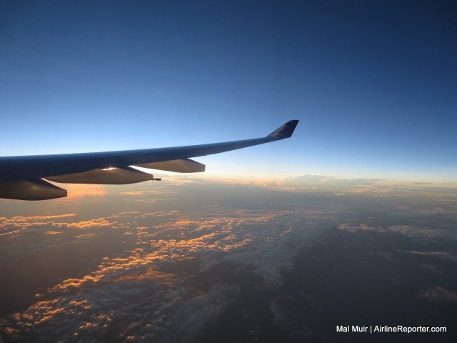 Sunset while cruising south to Auckland, just looks so pretty - Photo: Mal Muir | AirlineReporter.com