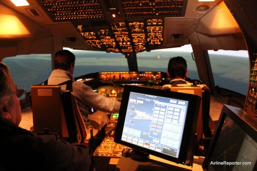 Pilots get training in the Boeing 767 simulator.
