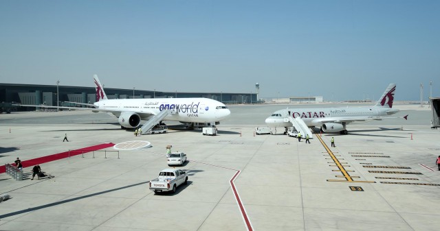 The Oneworld Liveried Qatar 777 parked at Hamad International Airport prior to the Oneworld signing Ceremony - Photo: Qatar Airways