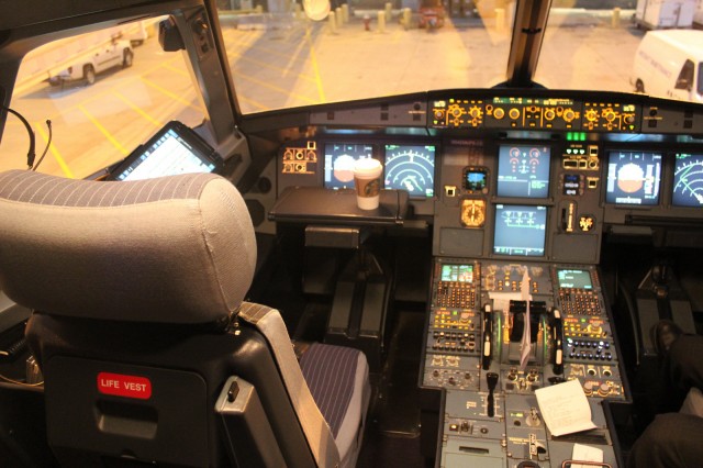 Have to love the Starbucks coffee sitting on the tray table in the Virgin America flight deck.